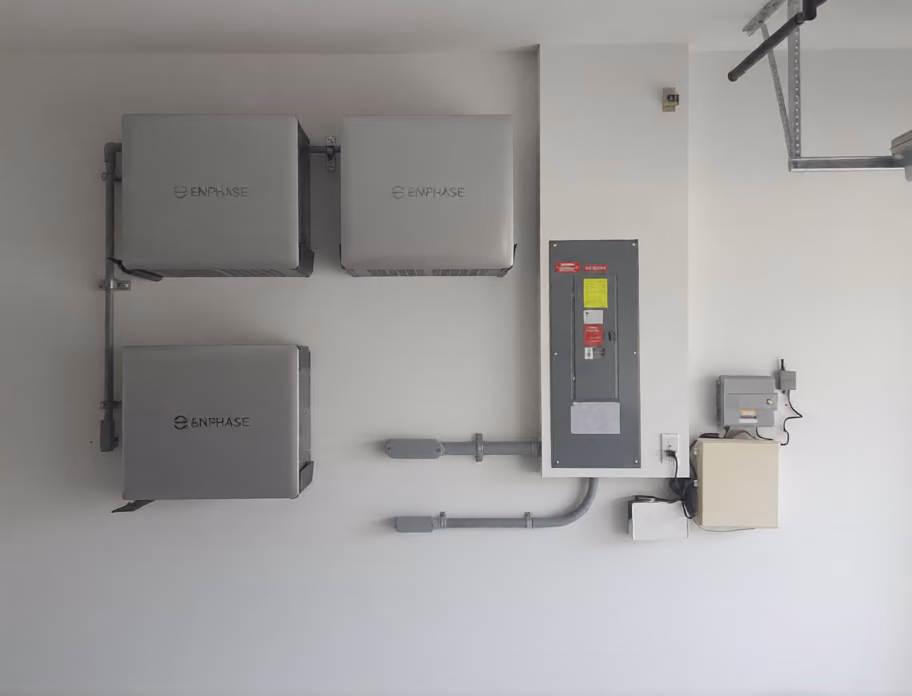 Three Enphase IQ Battery 10C units installed in a Nature Coast garage by May Electric Solar