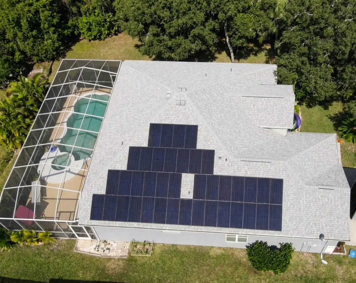 Aerial view of a rooftop solar installation on a Spring Hill home on Florida's Nature Coast by May Electric Solar